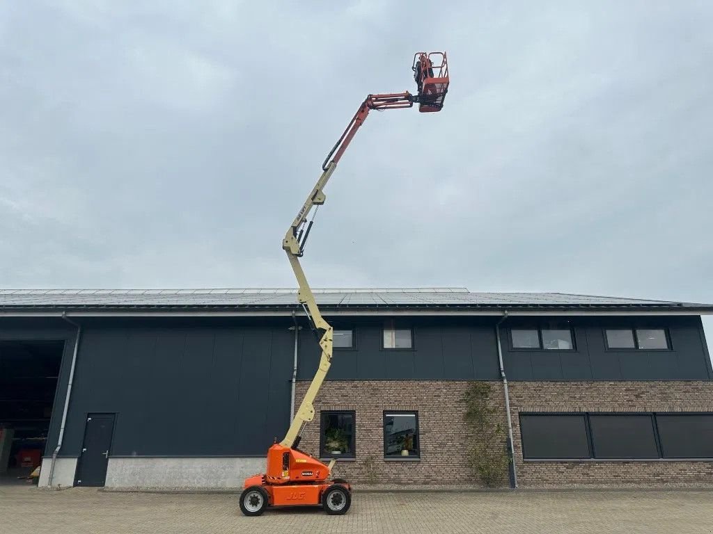 Teleskoparbeitsbühne Türe ait JLG M450AJ Kubota Hybride Diesel Elektra Knikarm Hoogwerker 15.7 met, Gebrauchtmaschine içinde VEEN (resim 3)