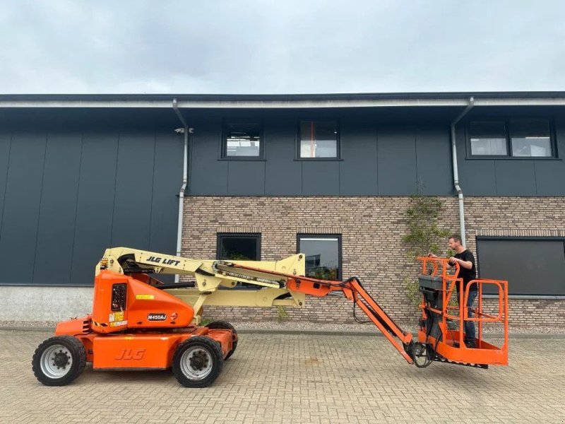 Teleskoparbeitsbühne van het type JLG M450AJ Kubota Hybride Diesel Elektra Knikarm Hoogwerker 15.7 met, Gebrauchtmaschine in VEEN (Foto 1)