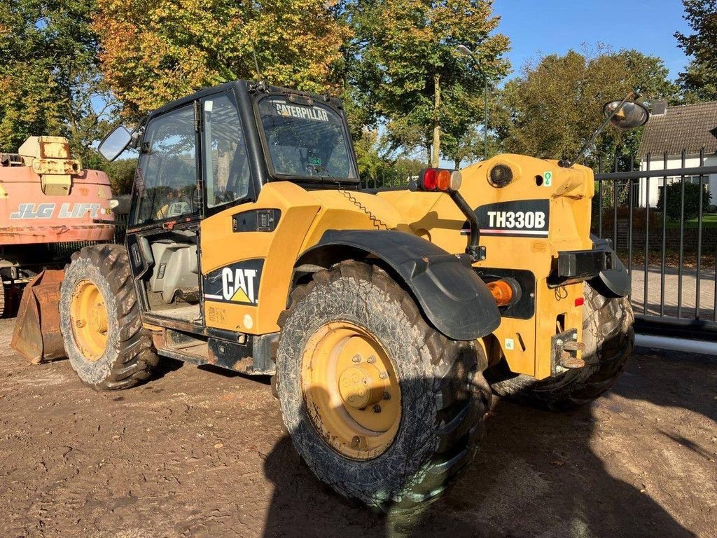 Teleskoplader des Typs Caterpillar TH330B, Gebrauchtmaschine in Antwerpen (Bild 3)