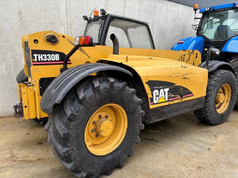 Teleskoplader van het type Caterpillar TH330B, Gebrauchtmaschine in Wevelgem (Foto 1)