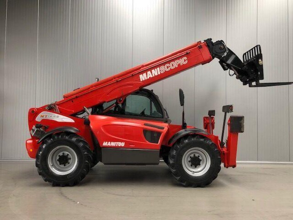 Teleskopstapler del tipo Manitou MT 1440, Neumaschine en Путрівка (Imagen 3)