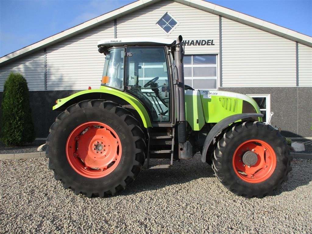 Traktor tip CLAAS 697 Med frontlift, affejederet kabine og vendergear ved rettet, Gebrauchtmaschine in Lintrup (Poză 2)