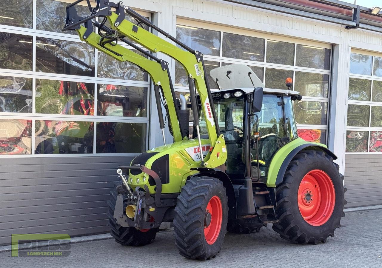 Traktor typu CLAAS ARION 410 CIS A21 + FL 100 e, Gebrauchtmaschine v Homberg (Ohm) - Maulbach (Obrázok 1)