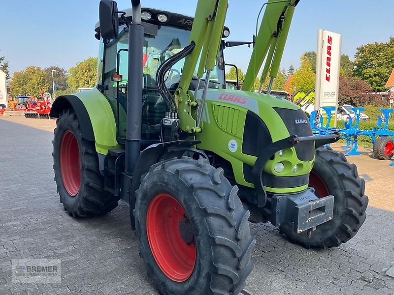 Traktor des Typs CLAAS ARION 610 C  +  FL 120, Gebrauchtmaschine in Asendorf (Bild 4)