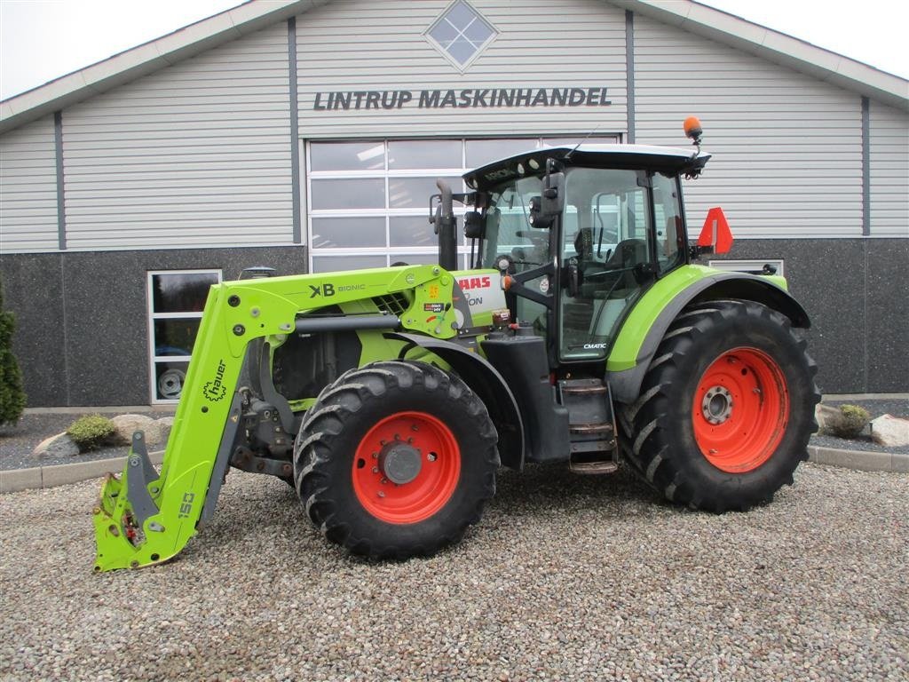 Traktor типа CLAAS ARION 650 C-Matic med frontlæsser, frontlift og frontPTO, Gebrauchtmaschine в Lintrup (Фотография 1)