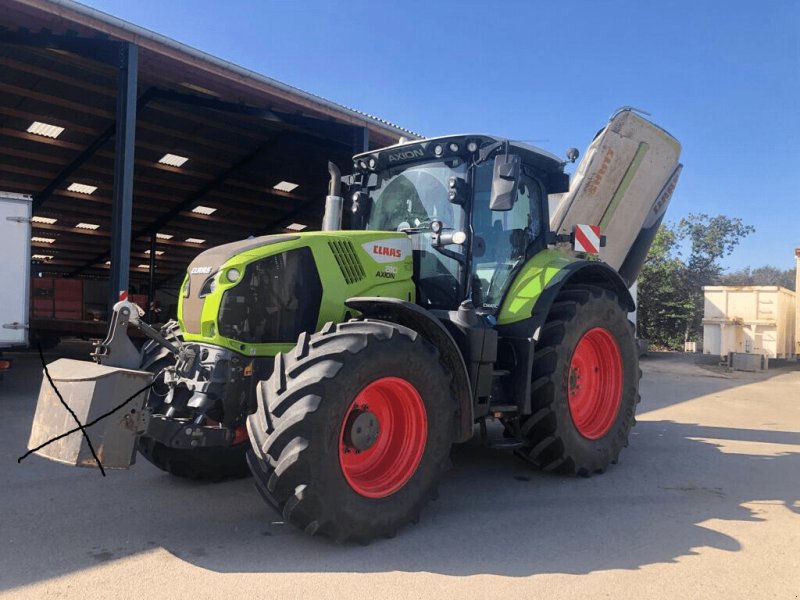 Traktor des Typs CLAAS AXION 810 CMATIC BUSINESS, Gebrauchtmaschine in PLOUIGNEAU (Bild 1)