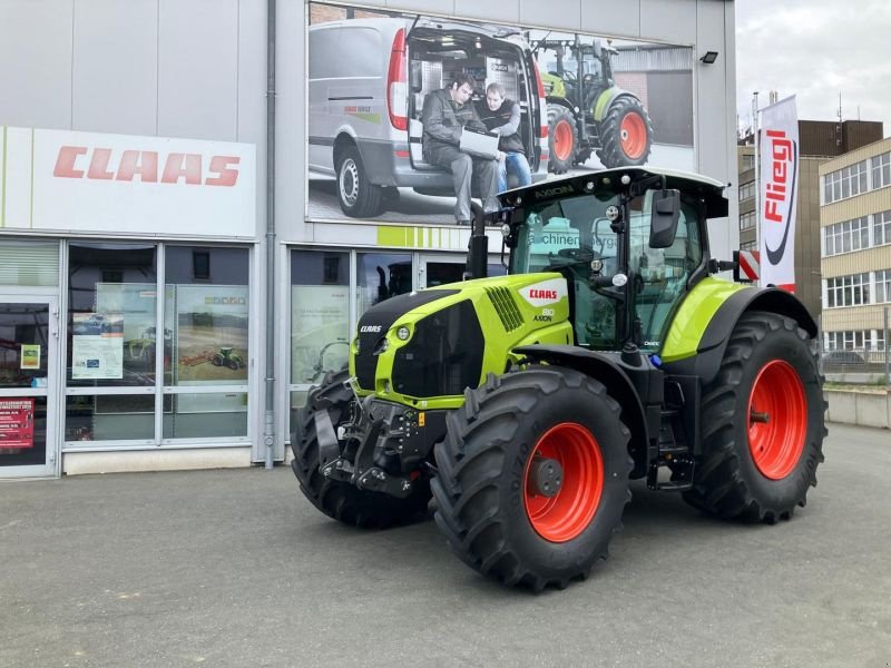 Traktor Türe ait CLAAS AXION 810 CMATIC CEBIS STAGE V, Neumaschine içinde Hof (resim 1)