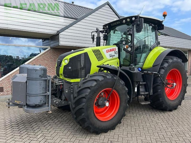 Traktor от тип CLAAS axion 810, Gebrauchtmaschine в ag BROEKLAND (Снимка 1)