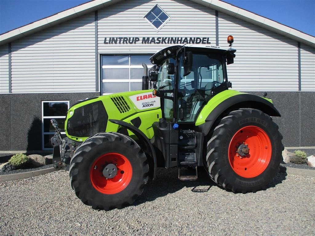 Traktor van het type CLAAS Axion 830 Med frontlift, Gebrauchtmaschine in Lintrup (Foto 1)