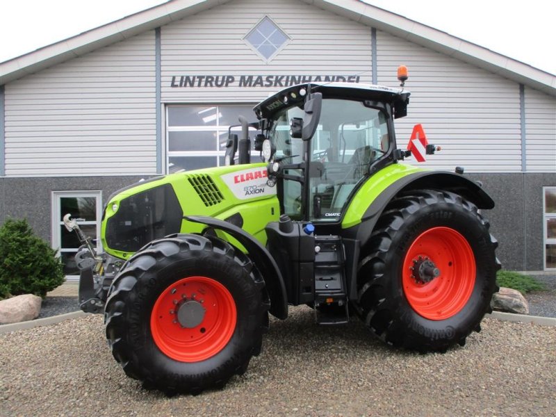 Traktor типа CLAAS AXION 870 CMATIC med frontlift og front PTO, GPS ready, Gebrauchtmaschine в Lintrup (Фотография 1)