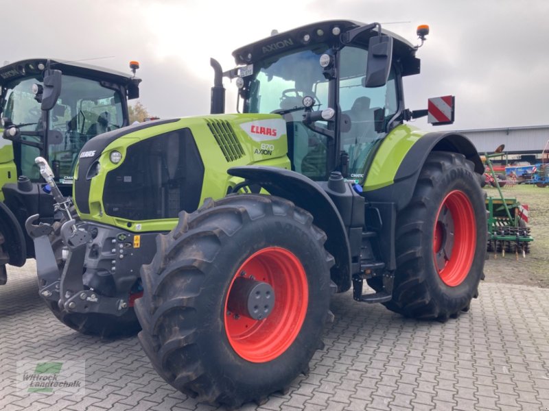 Traktor of the type CLAAS Axion 870 Cmatic, Neumaschine in Rhede / Brual (Picture 1)