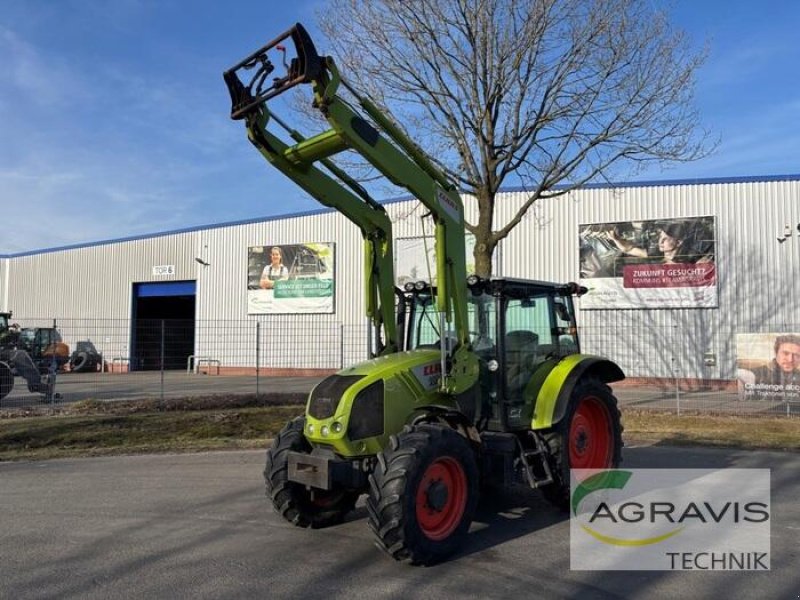 Traktor типа CLAAS AXOS 320 CX, Gebrauchtmaschine в Meppen (Фотография 1)