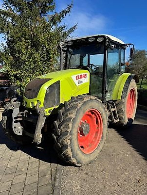 Traktor van het type CLAAS Axos 340 CX, Gebrauchtmaschine in Muespach (Foto 1)