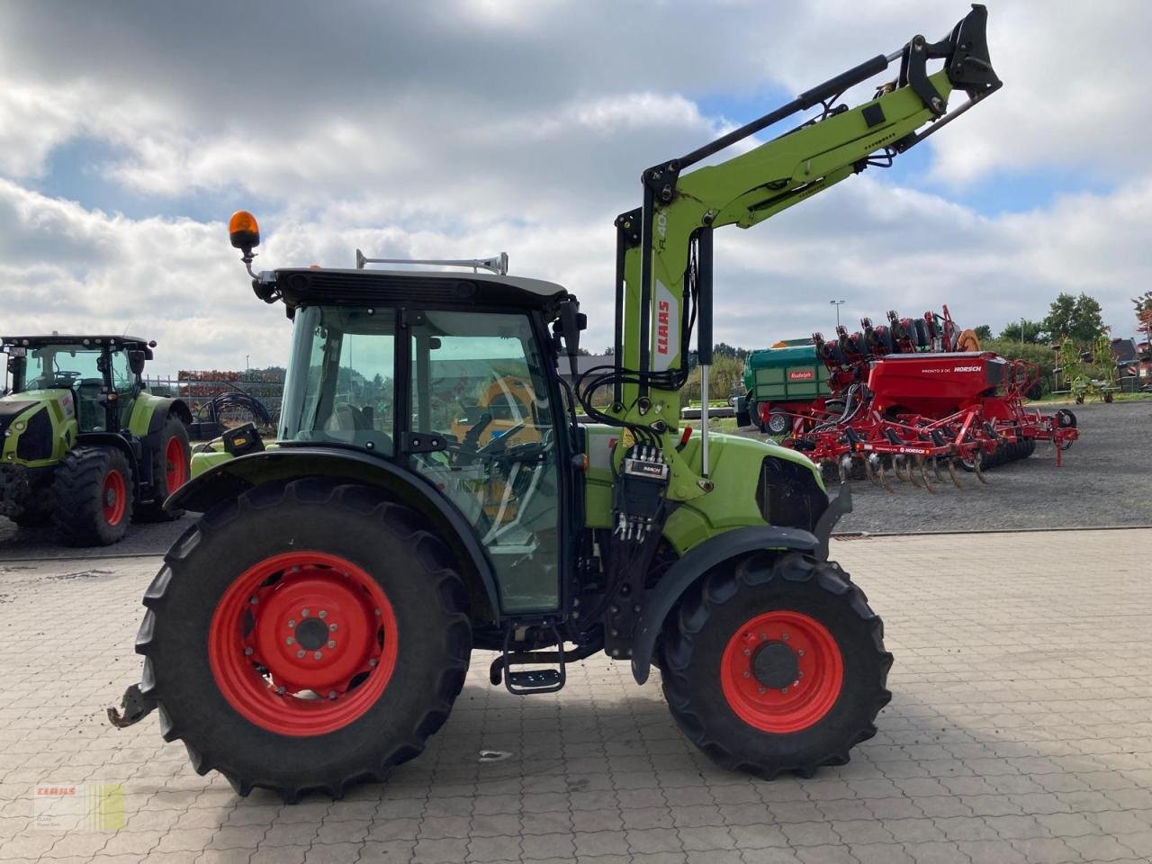 Traktor Türe ait CLAAS ELIOS 210 CONCEPT, Frontlader FL 40 E, Kriechgang, Klima, Druckluft, nur 2.572 h !, Gebrauchtmaschine içinde Ankum (resim 4)