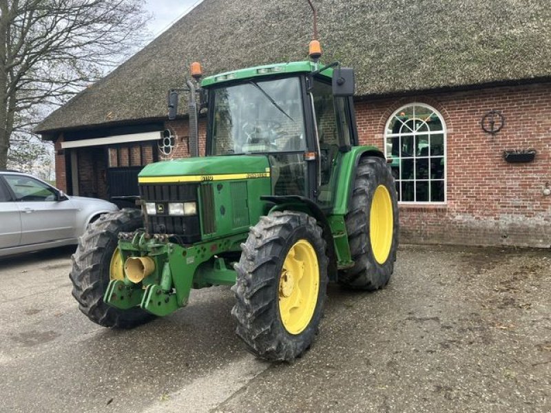 Traktor типа John Deere 6110, Gebrauchtmaschine в St. - Jacobiparochie