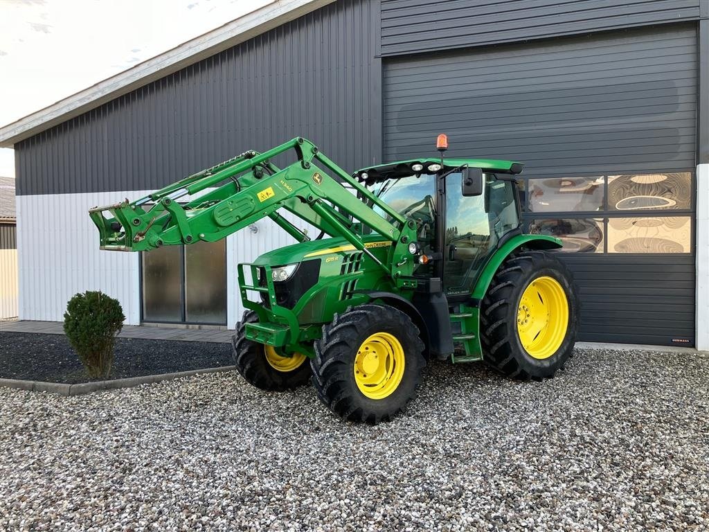 Traktor des Typs John Deere 6115R med John Deere H310 frontlæsser, Gebrauchtmaschine in Thorsø (Bild 1)