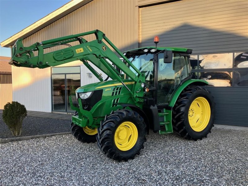 Traktor of the type John Deere 6115R med John Deere H310 frontlæsser, Gebrauchtmaschine in Thorsø