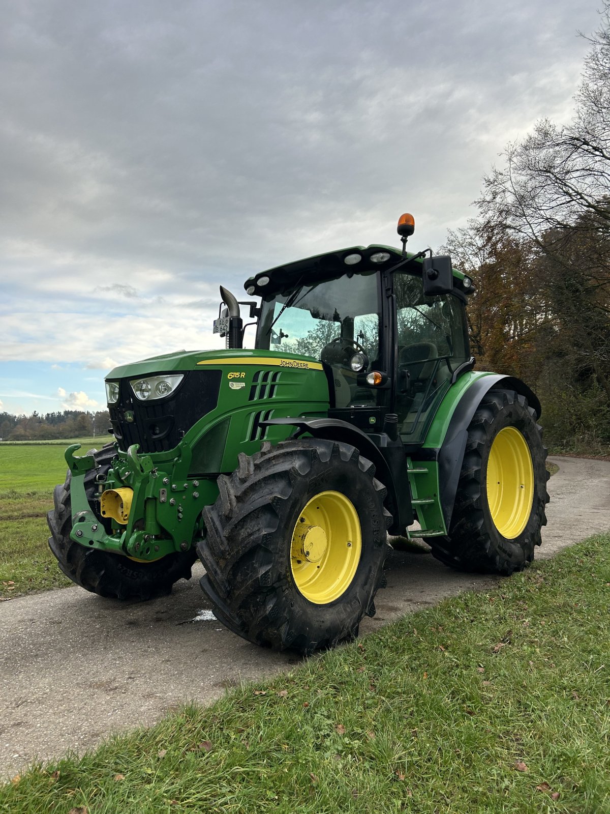 Traktor of the type John Deere 6115R, Gebrauchtmaschine in Tüßling (Picture 1)