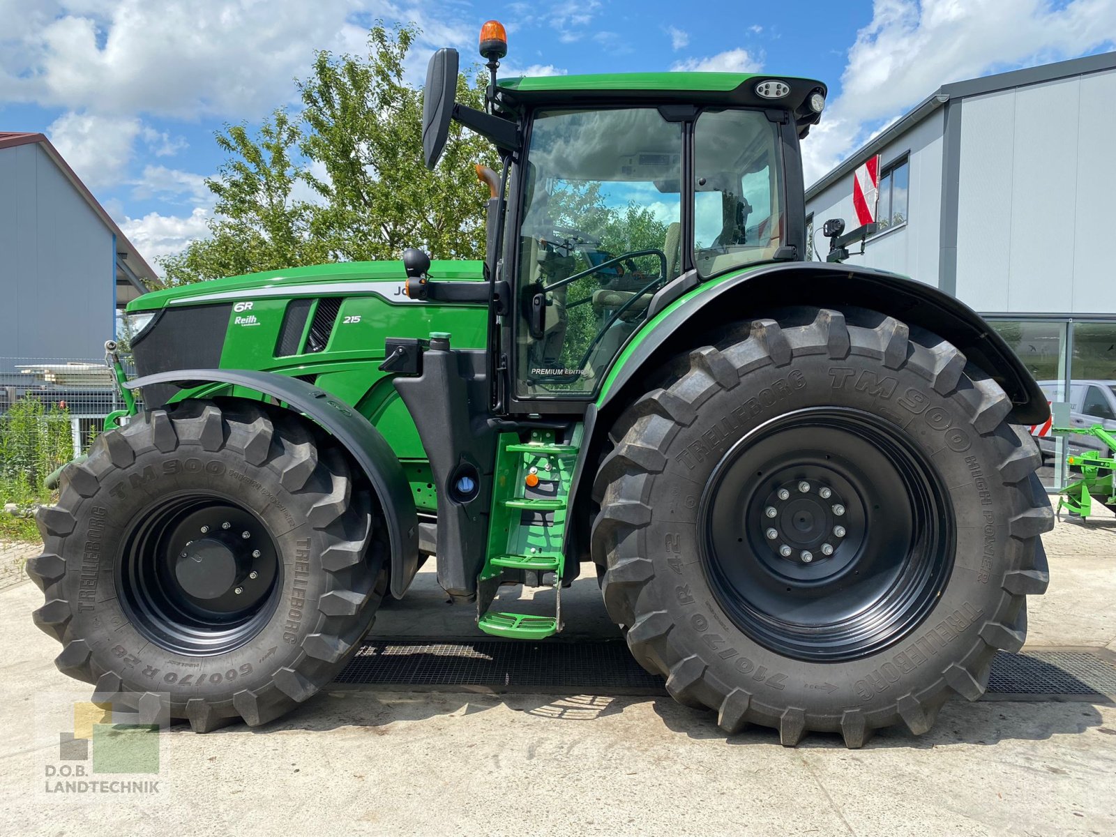 Traktor типа John Deere 6R 215 6R215, Gebrauchtmaschine в Brunnen (Фотография 1)