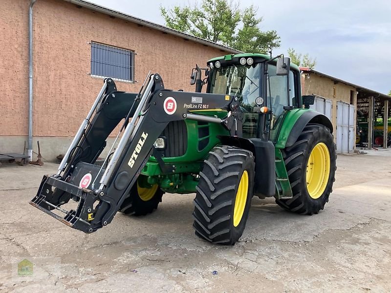 Traktor van het type John Deere 7530 Premium mit neuwertigen Stoll Frontlader, Gebrauchtmaschine in Salsitz (Foto 1)