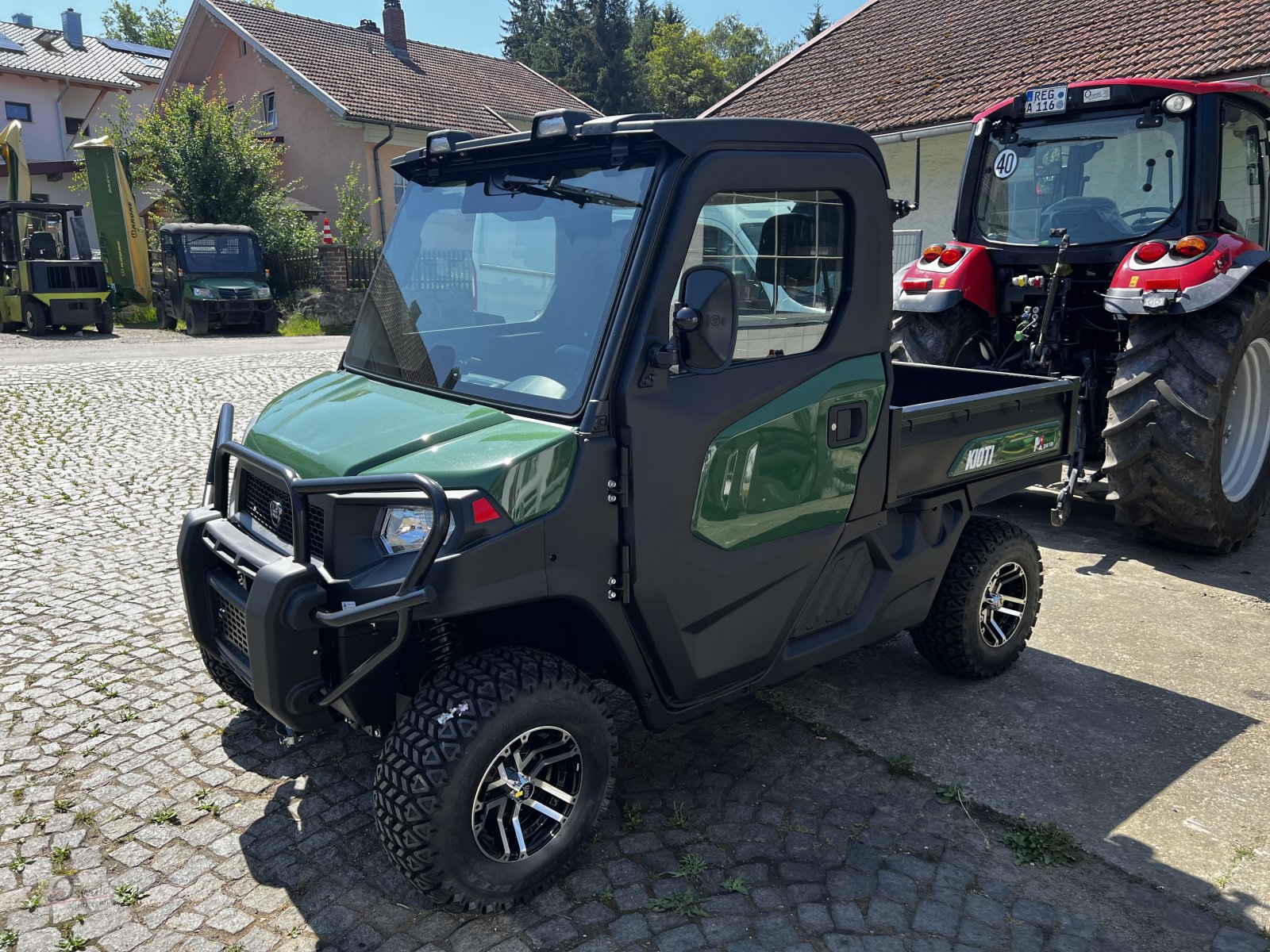 Traktor typu Kioti K9 2400, Neumaschine v Regen (Obrázek 1)