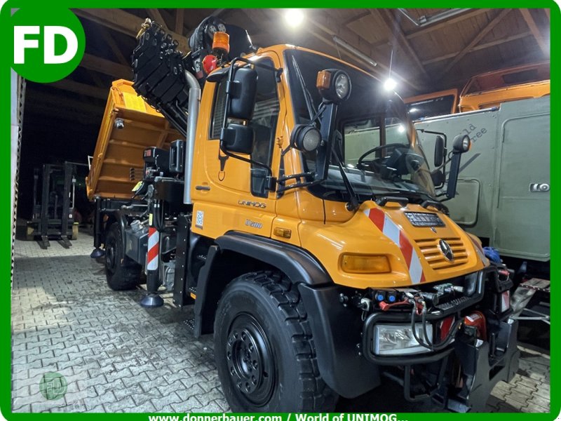 Traktor des Typs Mercedes-Benz Unimog U500 mit 21.6 Meter Kran, viele Extras , Kipper, Zapfwelle, Automatik, Gebrauchtmaschine in Hinterschmiding (Bild 1)