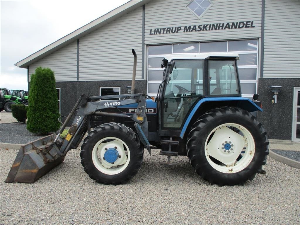 Traktor du type New Holland 7740 SL med fuldhydraulisk Veto FX13 frontlæsser på, Gebrauchtmaschine en Lintrup (Photo 8)