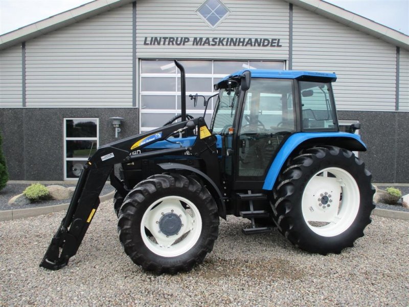 Traktor of the type New Holland 7740 SLE med frontlæsser, Gebrauchtmaschine in Lintrup (Picture 1)