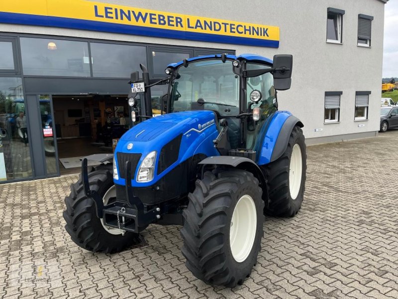 Traktor of the type New Holland T 5.100 PS, Neumaschine in Neuhof - Dorfborn (Picture 1)