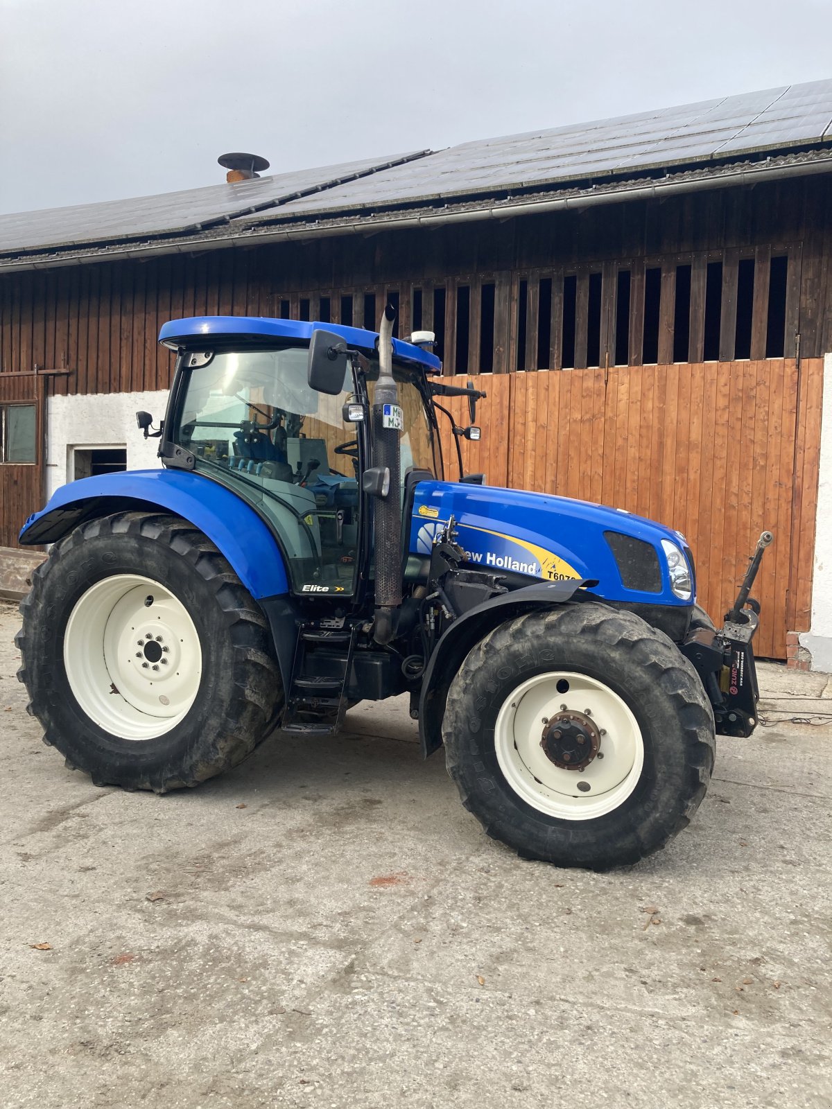 Traktor des Typs New Holland T 6070, Gebrauchtmaschine in Au am Inn (Bild 1)