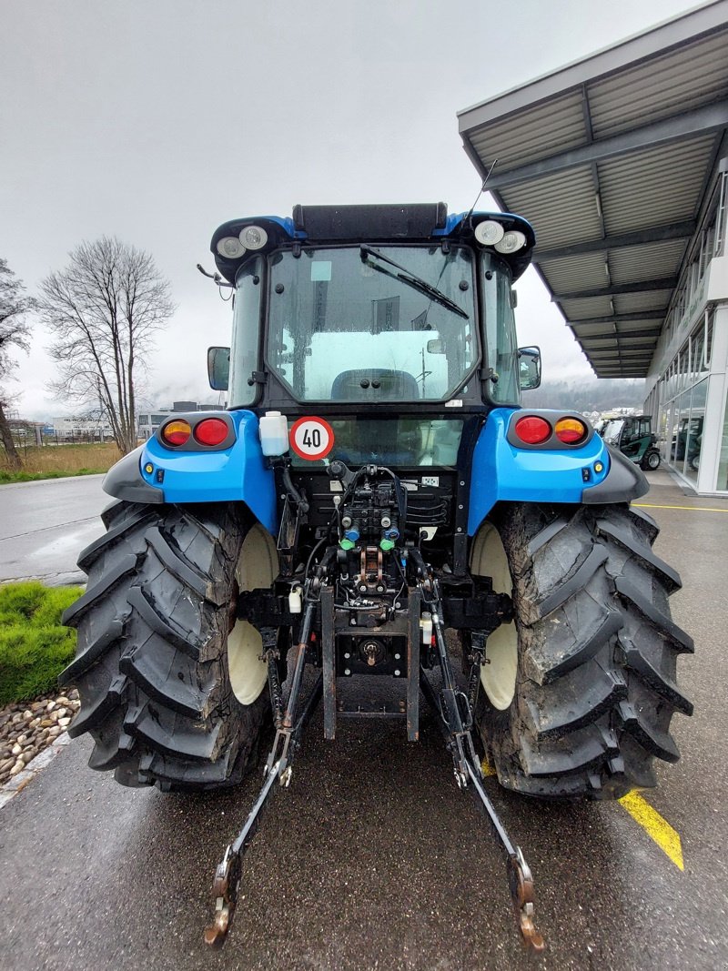 Traktor van het type New Holland T4.115, Gebrauchtmaschine in Lengnau (Foto 3)