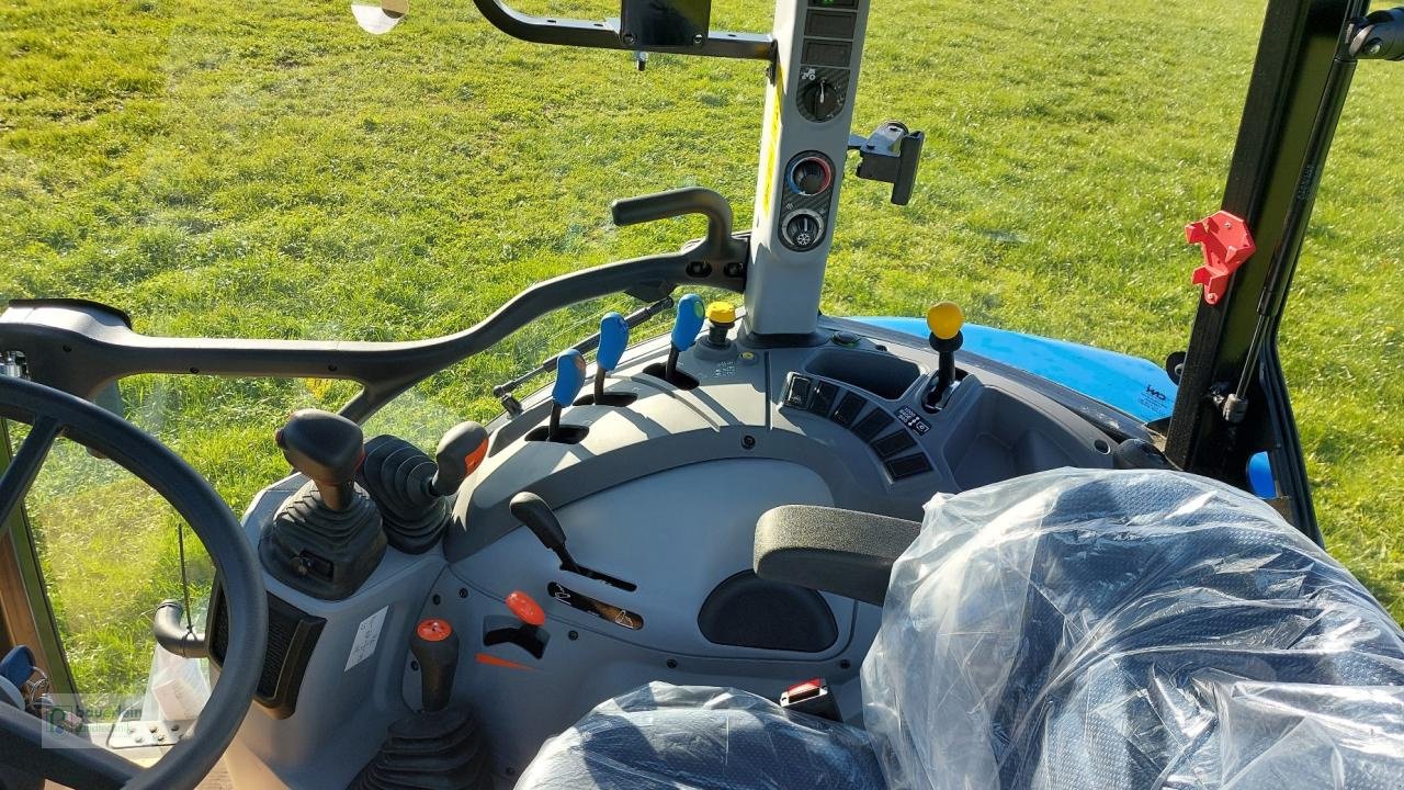 Traktor Türe ait New Holland T5.90, Neumaschine içinde Buch am Wald (resim 9)