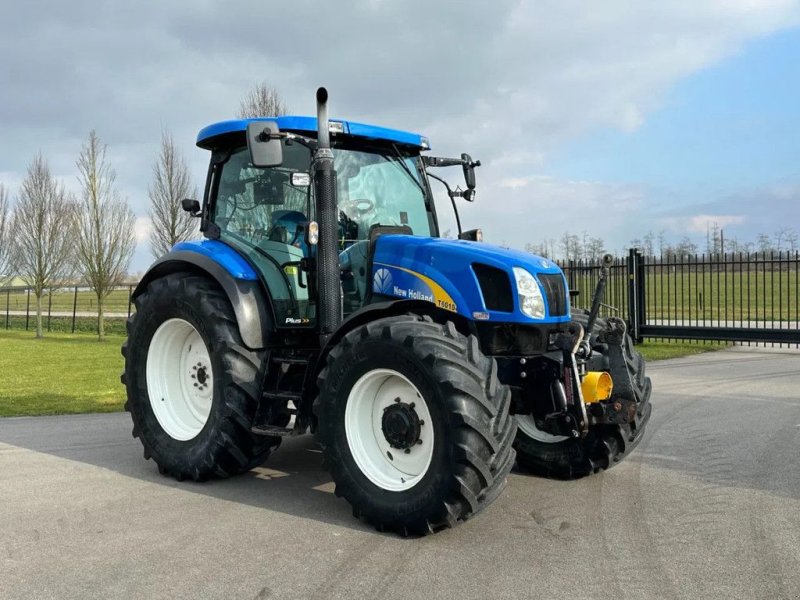 Traktor van het type New Holland T6010 Plus, Gebrauchtmaschine in BENNEKOM (Foto 1)