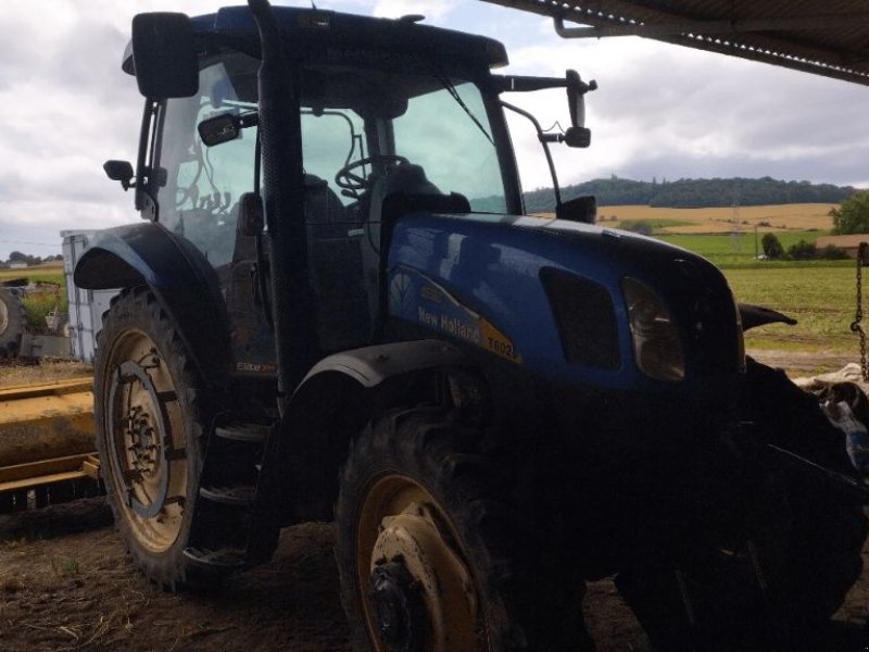 Traktor van het type New Holland T6020, Gebrauchtmaschine in ENNEZAT