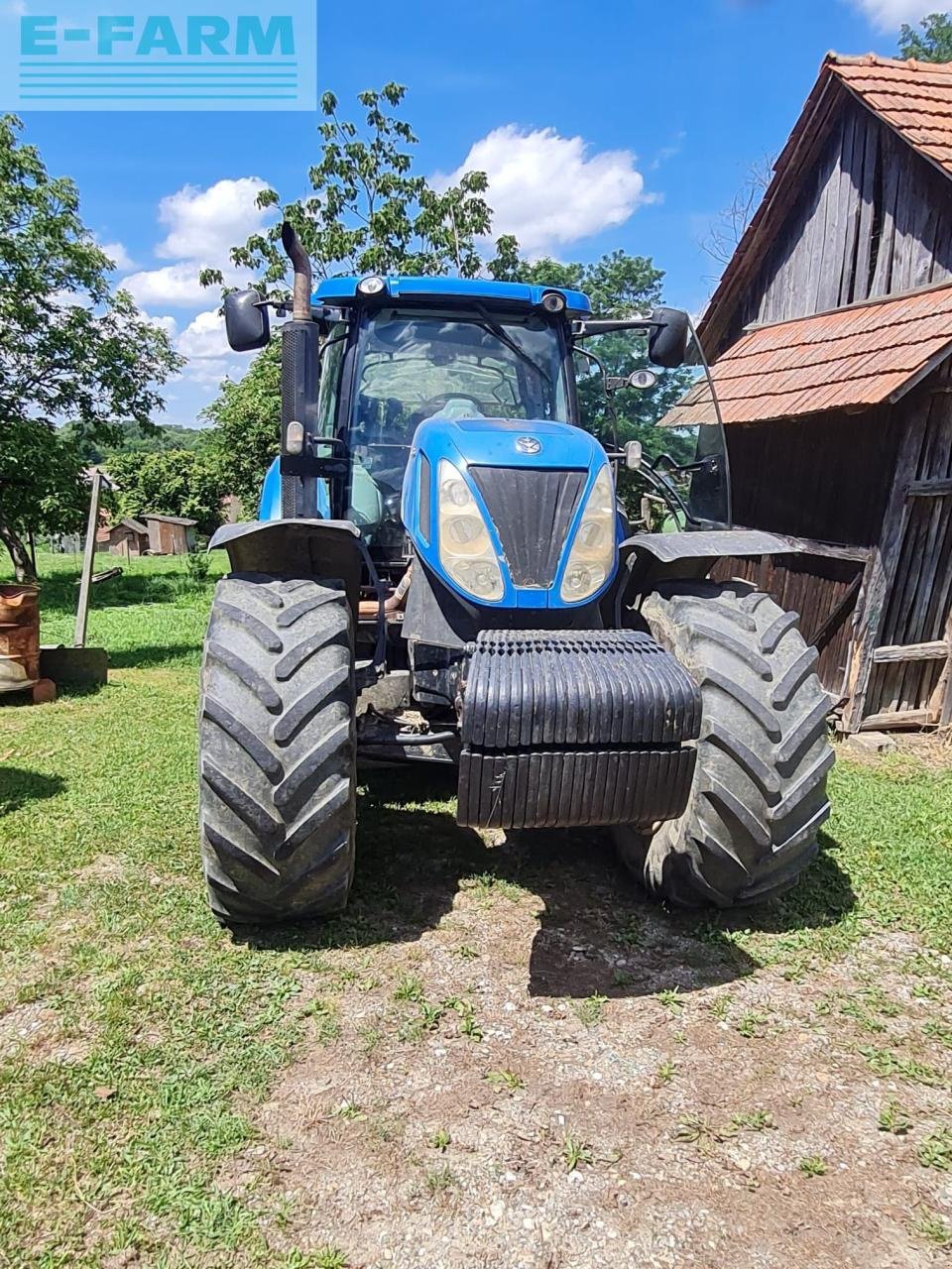 Traktor от тип New Holland T7050, Gebrauchtmaschine в Hamburg (Снимка 1)