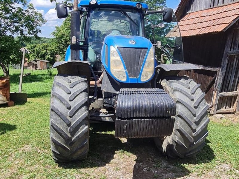 Traktor of the type New Holland T7050, Gebrauchtmaschine in Hamburg (Picture 1)