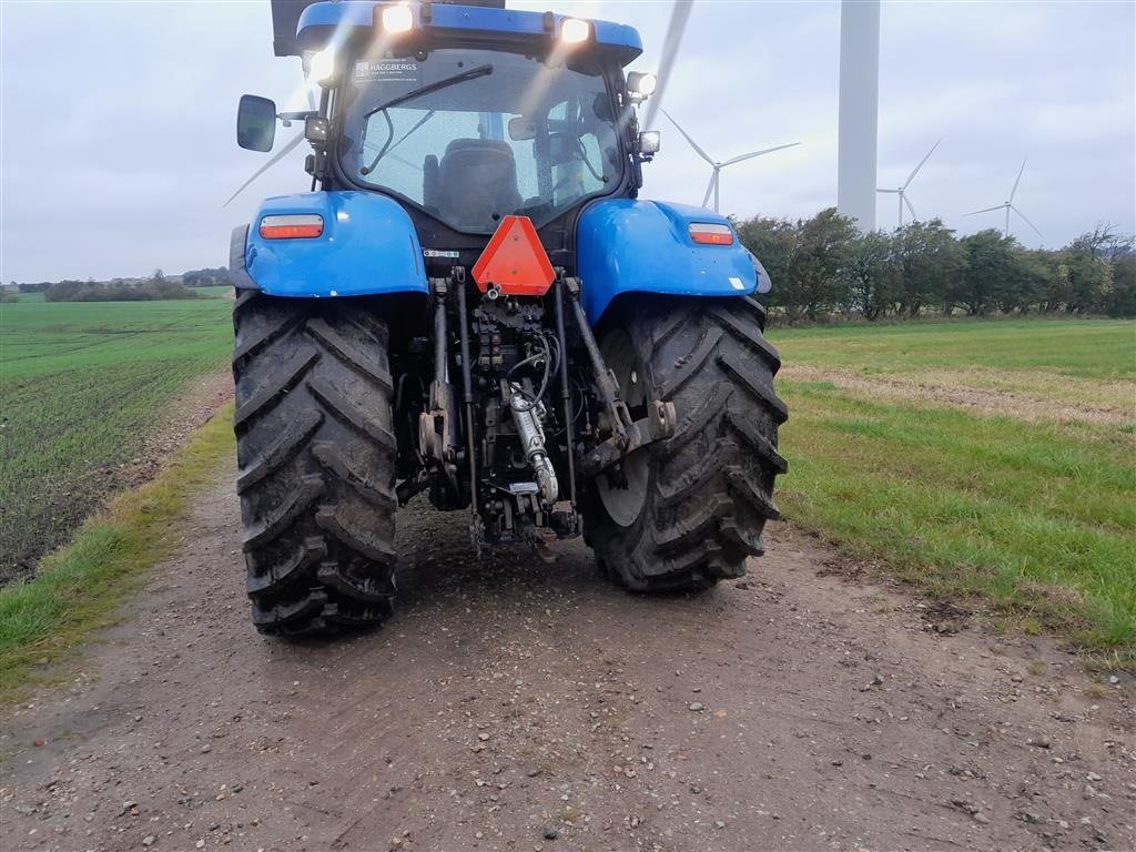 Traktor of the type New Holland T7060 POWER SHIFT(pc)Nye bagdæk Ålø Q76 frontlæsser hydr udskydelig trækbom/krog, Gebrauchtmaschine in Skive (Picture 5)