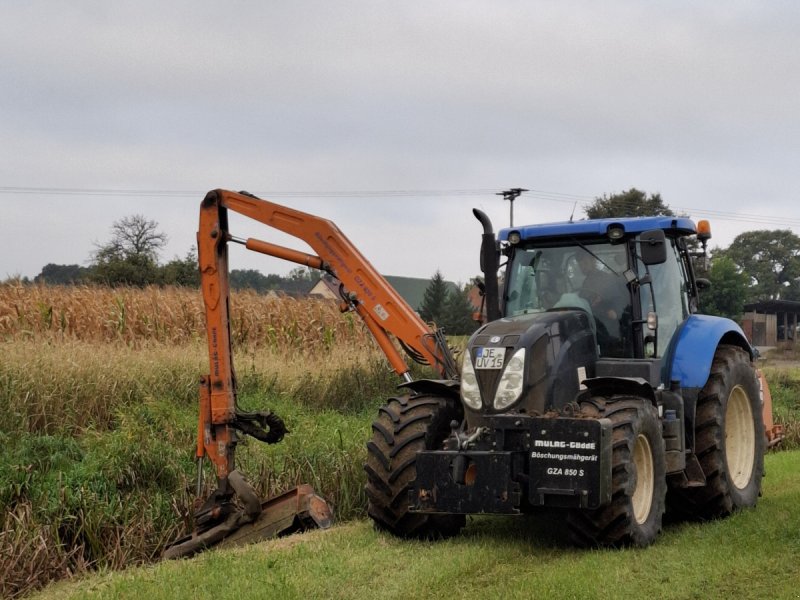 Traktor des Typs New Holland T7.170 mit Gödde Mähausleger GZA 850S, Gebrauchtmaschine in Jessen (Bild 1)