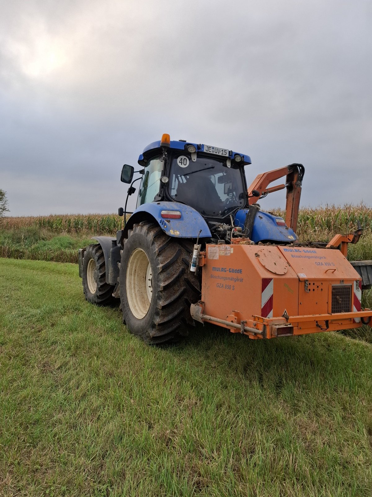 Traktor van het type New Holland T7.170 mit Gödde Mähausleger GZA 850S, Gebrauchtmaschine in Jessen (Foto 2)