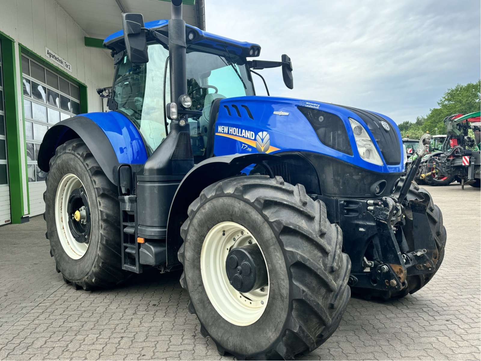 Traktor van het type New Holland T7.315, Gebrauchtmaschine in Elmenhorst-Lanken (Foto 3)