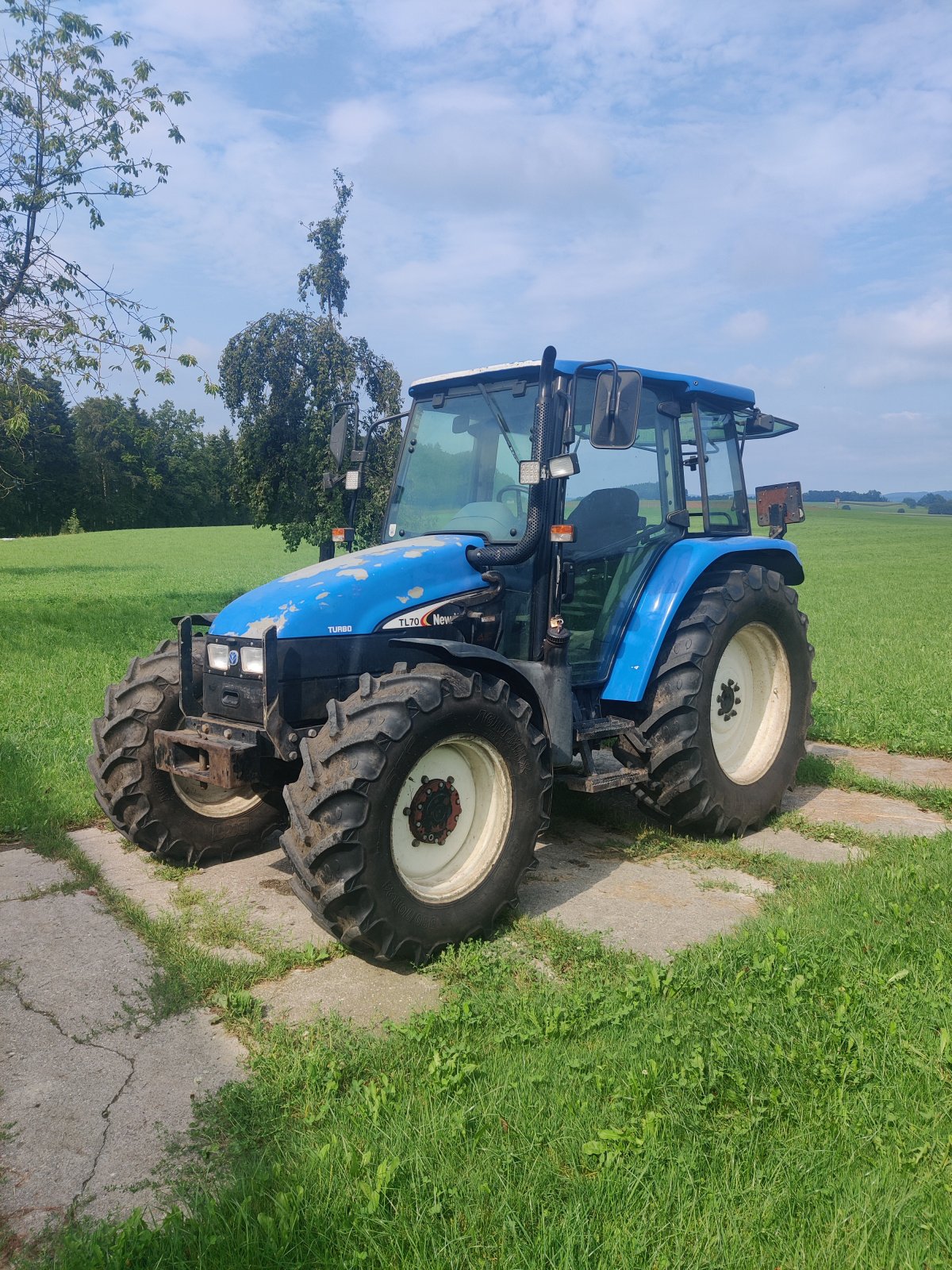 Traktor des Typs New Holland TL 70, Gebrauchtmaschine in St. Georgen bei Salzburg  (Bild 1)