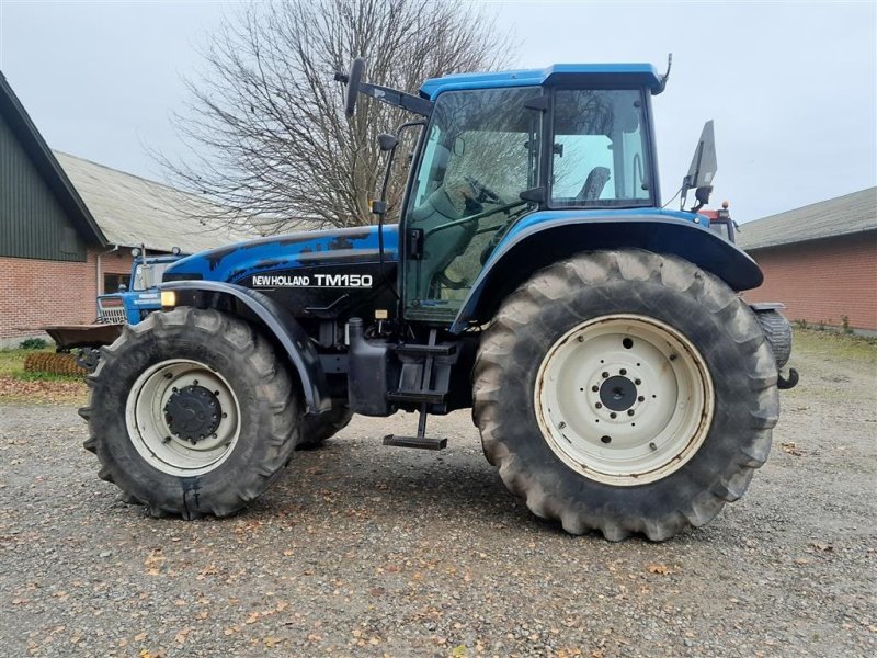 Traktor van het type New Holland TM 150 med frontlift og affjedret kabine, Gebrauchtmaschine in Skive