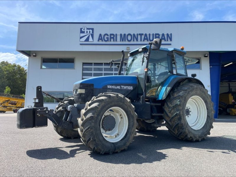 Traktor of the type New Holland TM 165, Gebrauchtmaschine in Montauban (Picture 1)