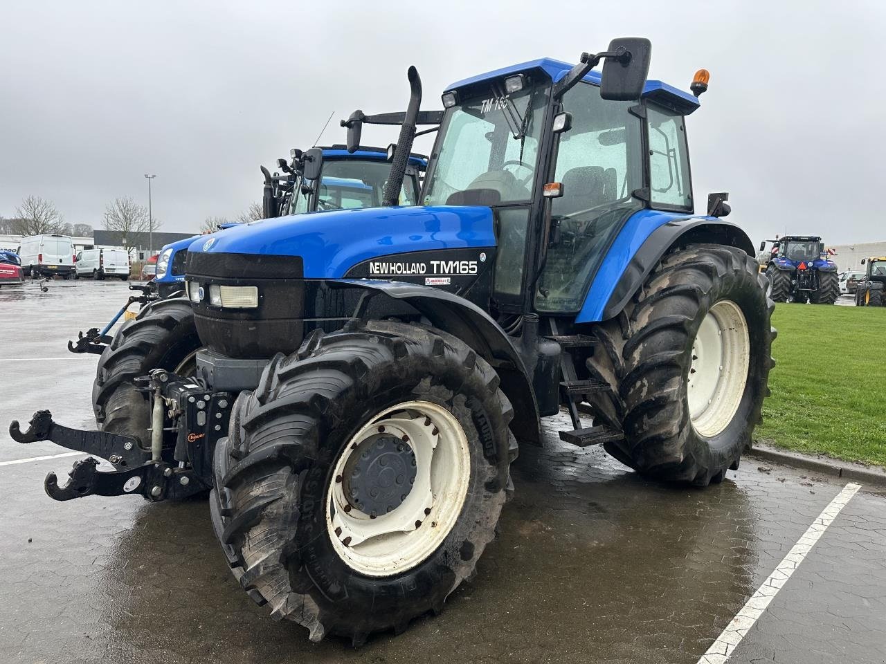 Traktor от тип New Holland TM165, Gebrauchtmaschine в Hadsten (Снимка 1)