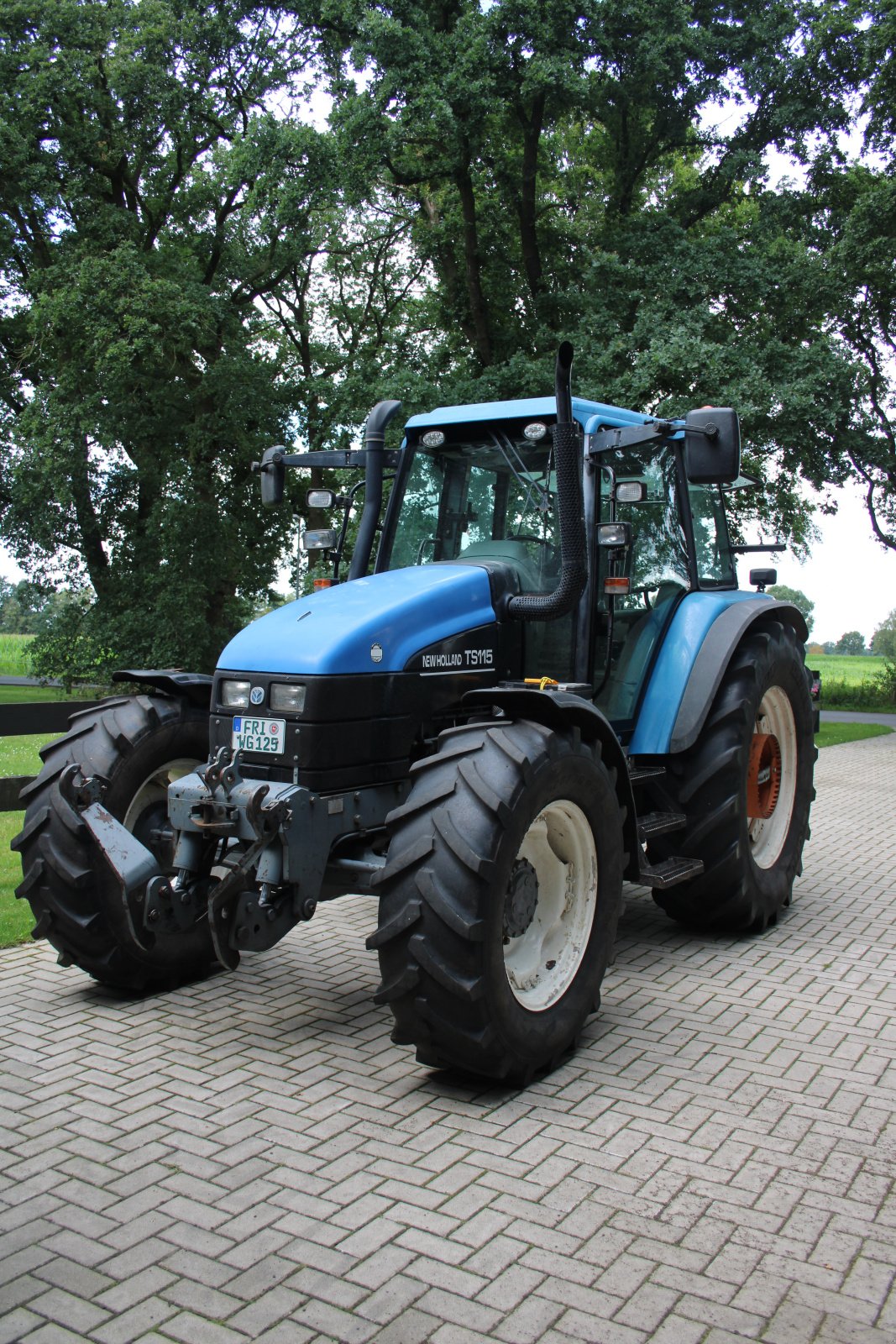 Traktor типа New Holland TS 115, Gebrauchtmaschine в Bockhorn (Фотография 1)