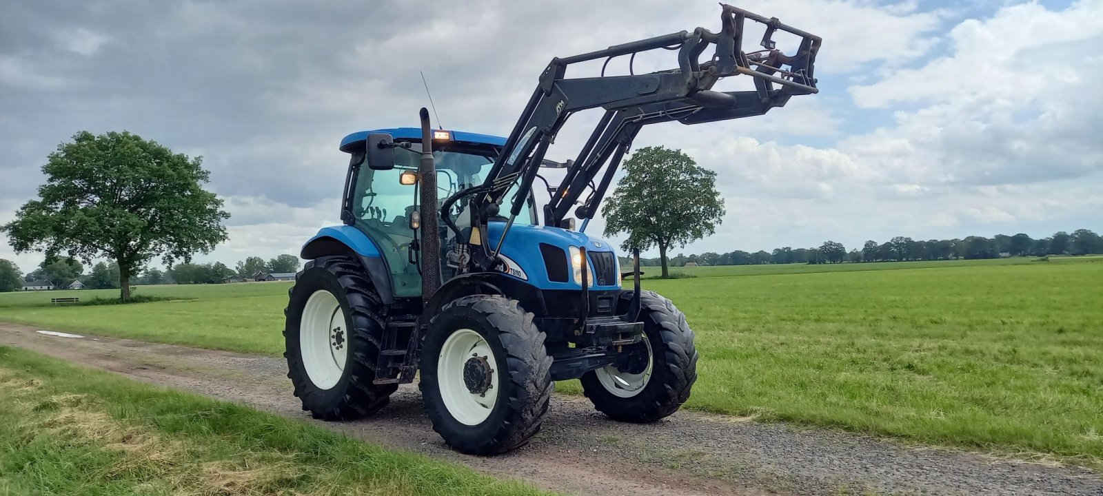 Traktor typu New Holland TS110A, Gebrauchtmaschine v Fleringen (Obrázok 2)