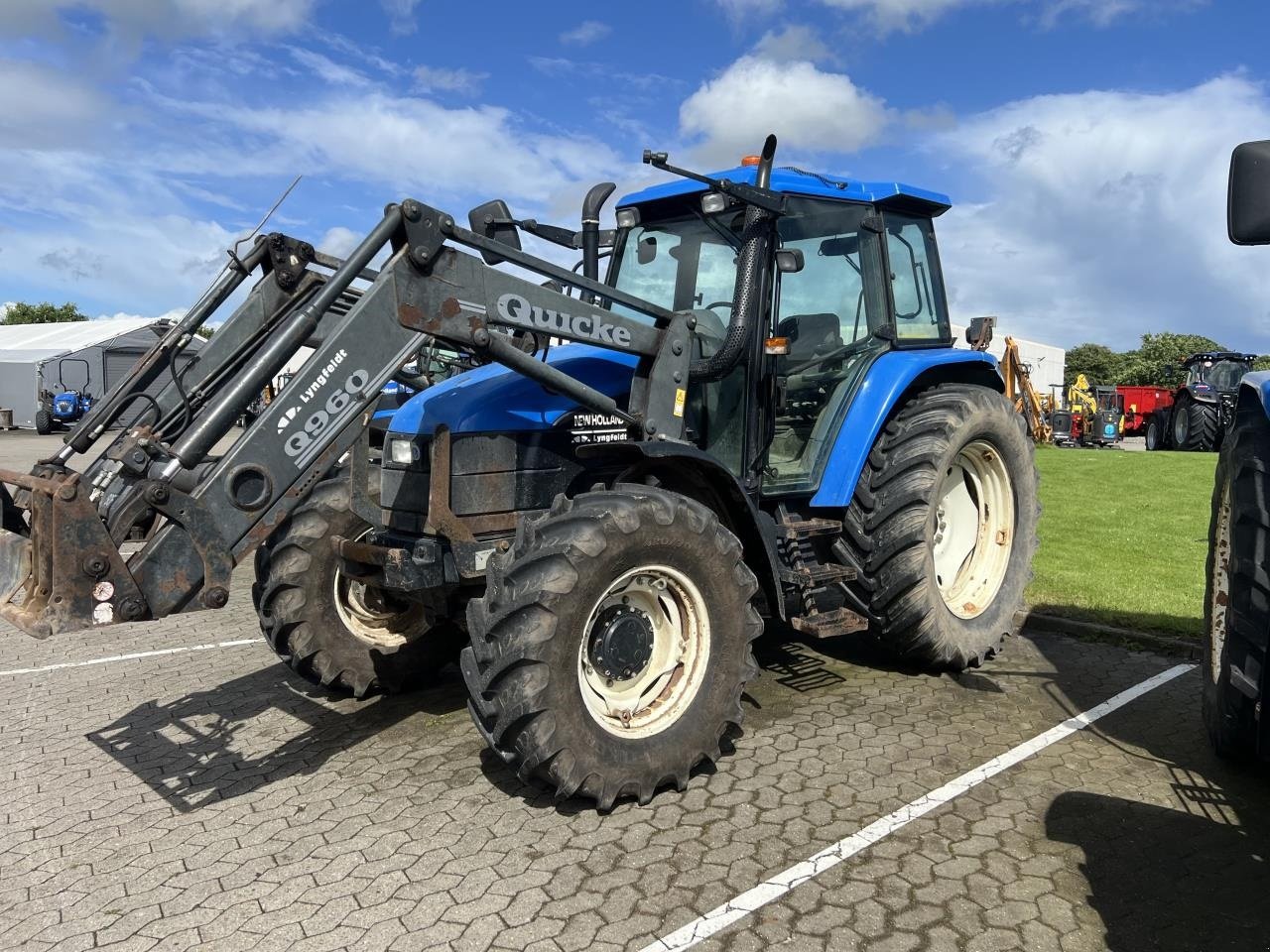 Traktor of the type New Holland TS115DL, Gebrauchtmaschine in Hadsten (Picture 1)