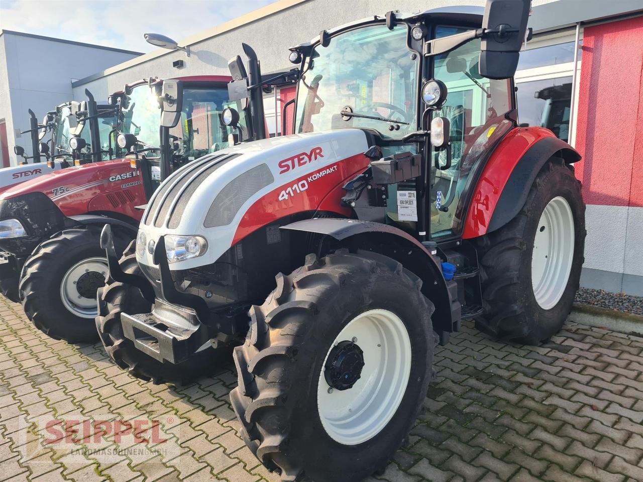 Traktor du type Steyr KOMPAKT 4110 HILO + MX T408, Neumaschine en Groß-Umstadt (Photo 1)