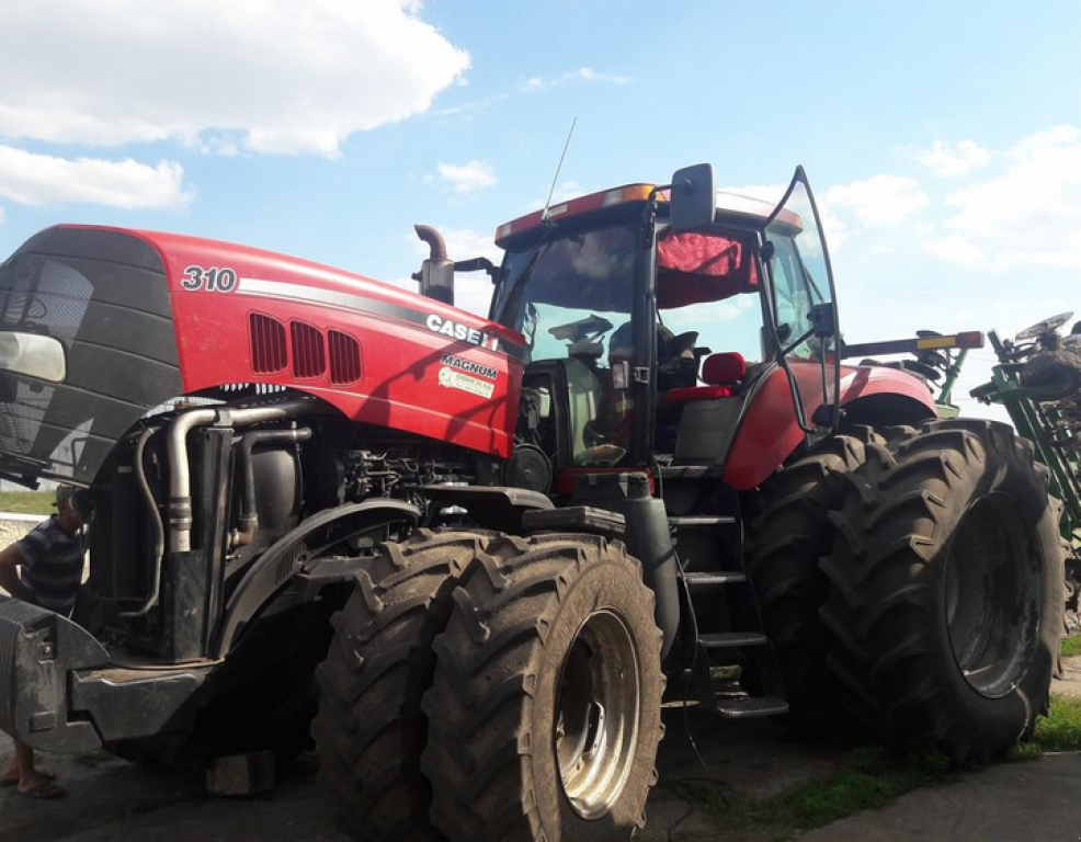 Oldtimer-Traktor van het type Case IH Magnum 310, Neumaschine in Дніпропетровськ (Foto 2)