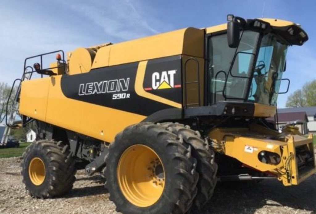 Oldtimer-Mähdrescher от тип Caterpillar Lexion 590R,  в Струмівка (Снимка 1)